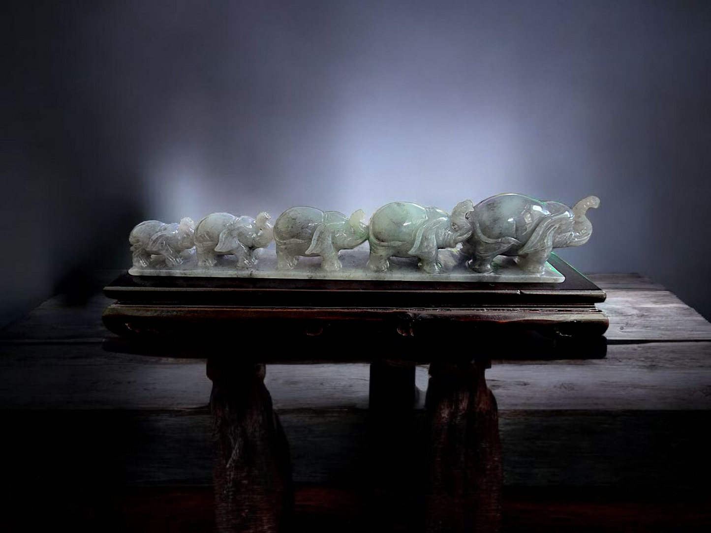 The Growth of Elephants Grey and Green Burmese A-Jadeite Ornament Showpiece with a Wooden Stand