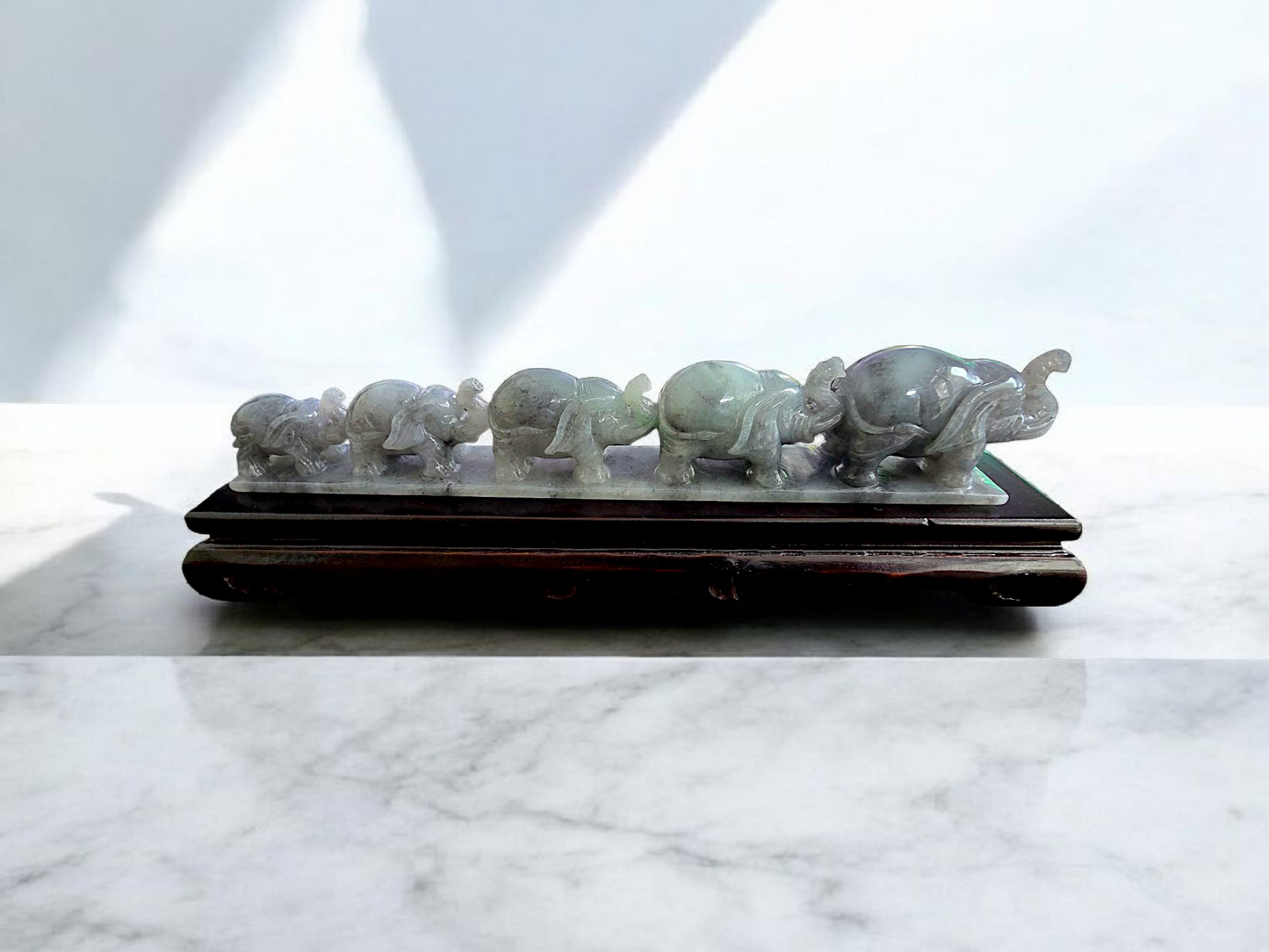 The Growth of Elephants Grey and Green Burmese A-Jadeite Ornament Showpiece with a Wooden Stand